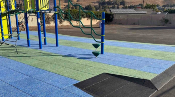 Why rubber surfacing in playgrounds is safe?