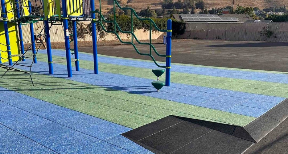 Why rubber surfacing in playgrounds is safe?